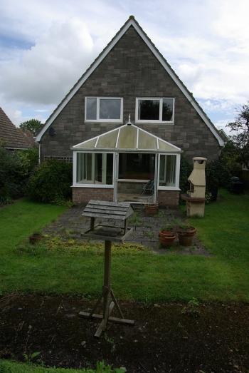 The back of the house now - with Simon's homemade bird table
