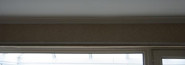 Can you see the bend ? (clue: the curtain rail is straight)