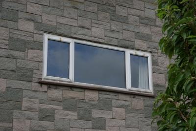 Front bedroom window, with obvious rust marks
