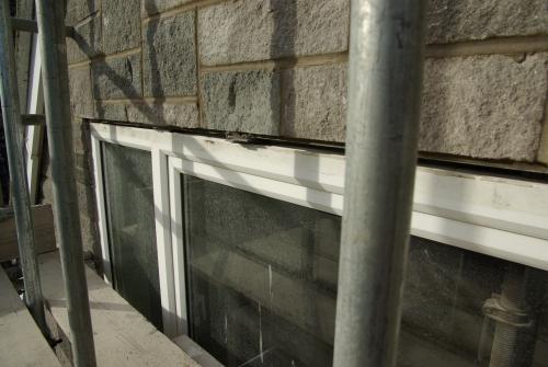 The outside of the back, right-hand bedroom window...