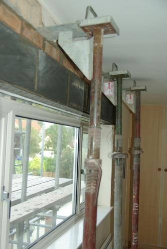 Props holding up the wall