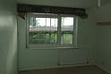 Gap above the back, right-hand bedroom window