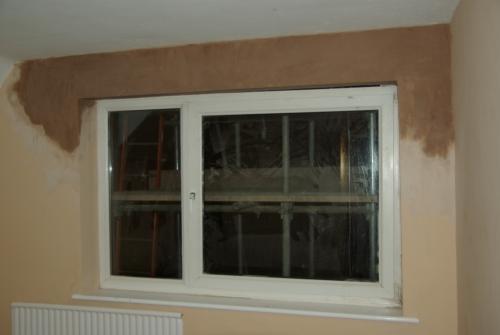 There's still a gap between the window and the lintel