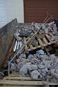The remains of the big lintel in the skip