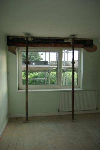 The right-hand bedroom is a bit tidier