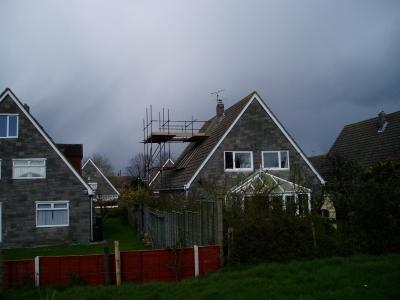 Cliff the neighbour very kindly let our scaffolders put supports in his garden