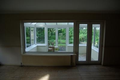 The builders' first delivery arrived at 7:35 on day one. I got them to put it in the conservatory.